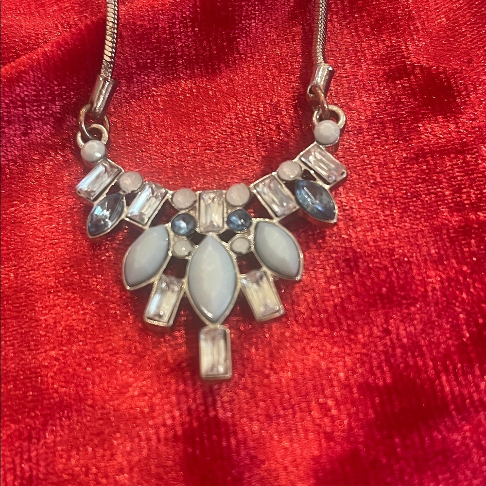 Vintage Charming Charlie Silver necklace with White and blue Gemstones.